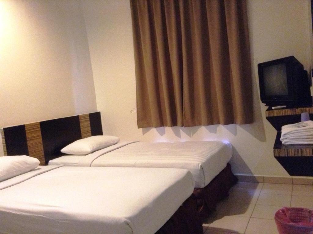 Hotel Traveller Kota Kinabalu Phòng bức ảnh